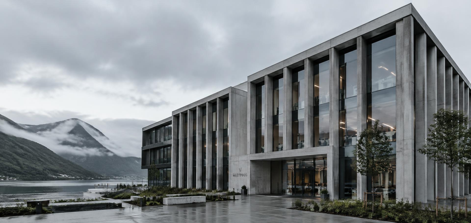 Moderne næringsbygg i betong og glass